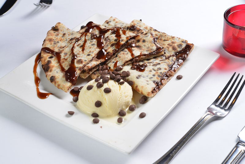 Naan with chocolate syrup and ice cream