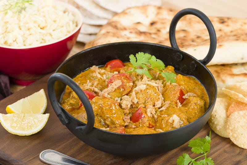 Karahi Gosht - Mutton curry cooked with tomatoes and topped with