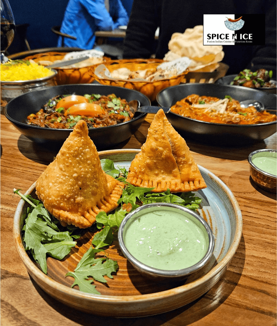 Samosa is a triangular pastry filled with spiced vegetables or meat, commonly found in South Asian cuisine.