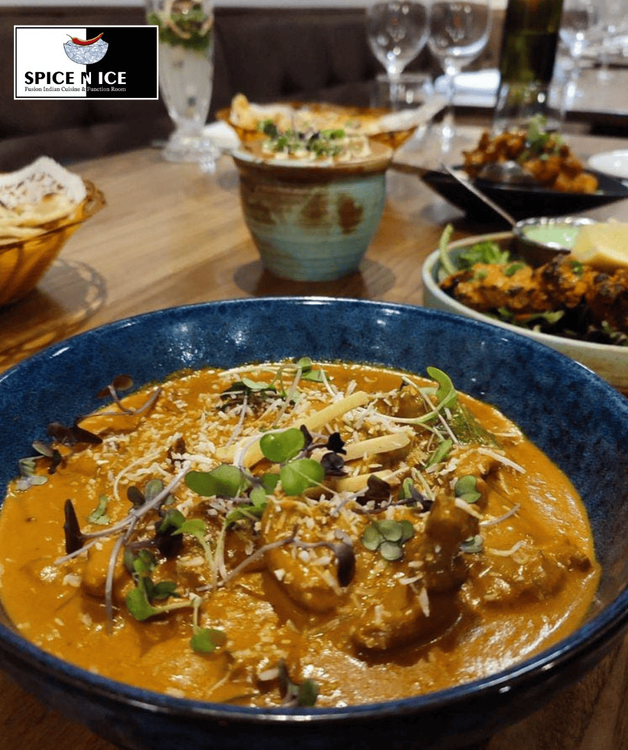 Aromatic Indian curry served at Spice N' Ice, showcasing traditional spices and herbs